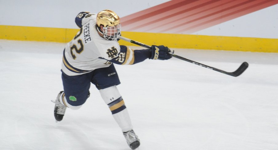 Andrew Peeke takes a slap shot during the 2018 Frozen Four