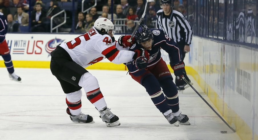 Artemi Panarin skates down the wall during the second period at Nationwide Arena