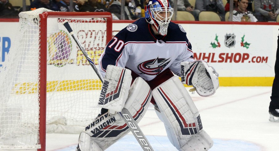 Nov 24, 2018; Pittsburgh, PA, USA; Columbus Blue Jackets goaltender Joonas Korpisalo (70) guards the net against the Pittsburgh Penguins during the second period at PPG PAINTS Arena. The Penguins won 4-2. Mandatory Credit: Charles LeClaire-USA TODAY Sports