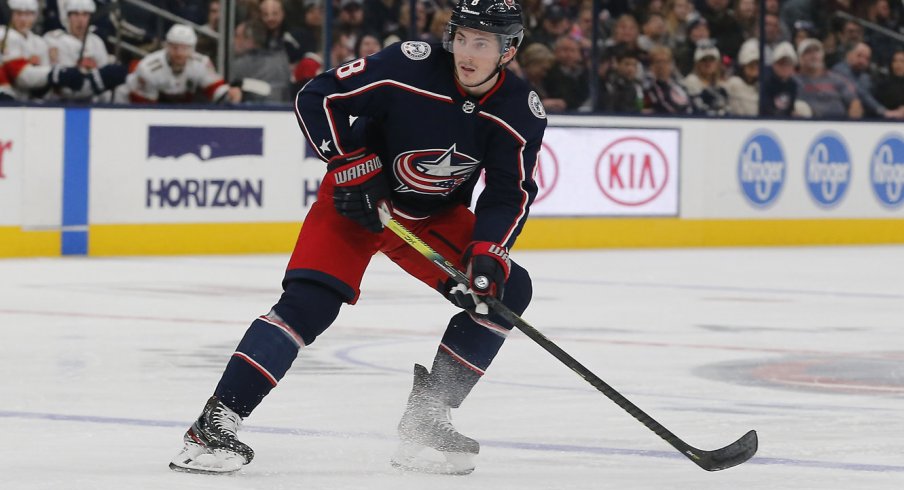 Dec 31, 2019; Columbus, Ohio, USA; Columbus Blue Jackets defenseman Zach Werenski (8) looks to pass against the Florida Panthers during the second period at Nationwide Arena. Mandatory Credit: Russell LaBounty-USA TODAY Sports