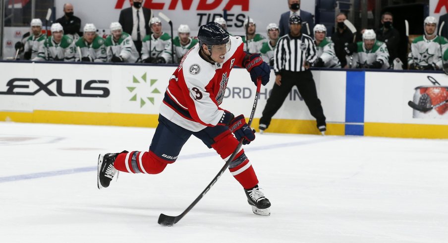 Columbus Blue Jackets right wing Cam Atkinson (13) wrists a shot on goal against the Dallas Stars during the first period at Nationwide Arena.