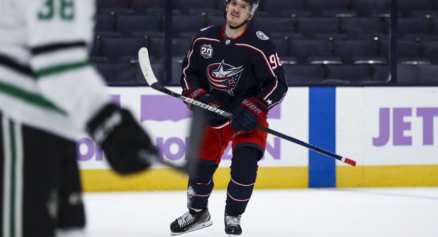 Feb 4, 2021; Columbus, Ohio, USA; Columbus Blue Jackets center Jack Roslovic (96) celebrates after scoring a goal against the Dallas Stars in the first period at Nationwide Arena.