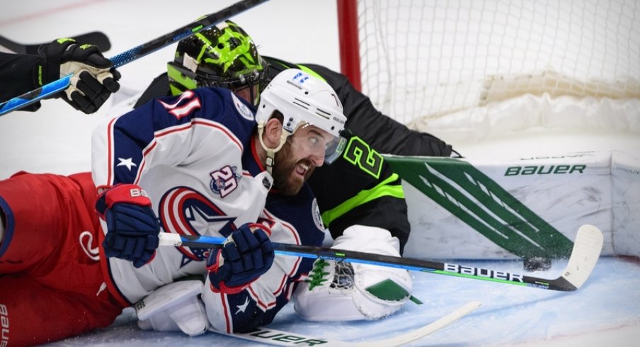  Dallas Stars goaltender Jake Oettinger (29) makes a pad save on a shot by Columbus Blue Jackets left wing Nick Foligno (71) during the third period at the American Airlines Center. 