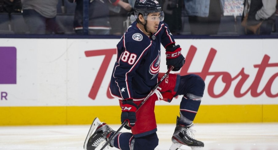 Columbus Blue Jackets right wing Kole Sherwood (88) stretches in warm-ups prior to a game against the Calgary Flames at Nationwide Arena.