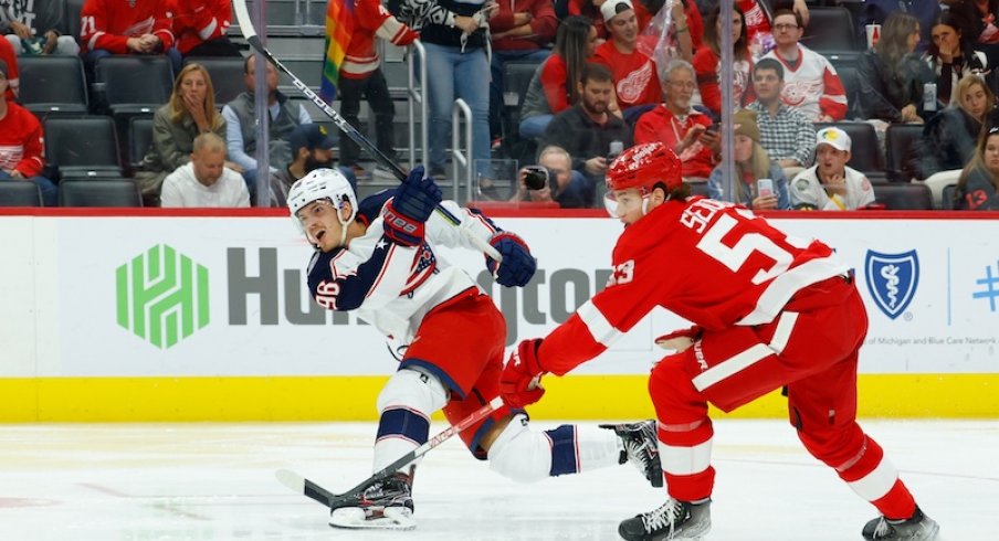 Jack Roslovic takes a shot against the Detroit Red Wings at Little Caesars Arena. 