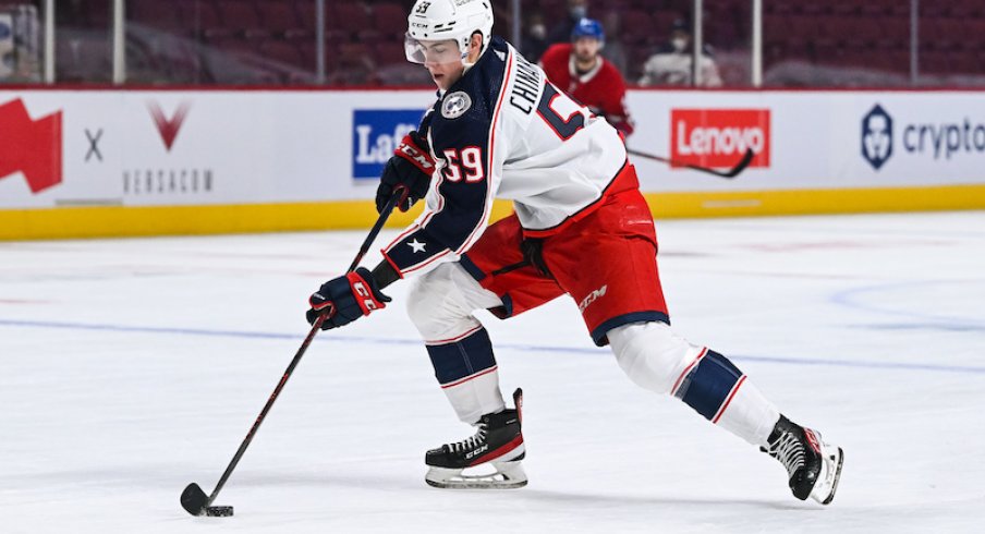 Columbus Blue Jackets' Yegor Chinakhov skates with the puck against the Montreal Canadiens at Bell Centre.