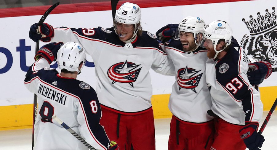 Columbus Blue Jackets' Patrik Laine celebrates his game-winning goal against the Montreal Canadiens at Bell Centre.