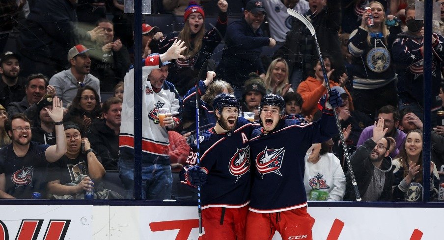 Oliver Bjorkstrand and Cole Sillinger celebrate one of the half dozen goals the Columbus Blue Jackets had in Sunday's win over the Vegas Golden Knights.