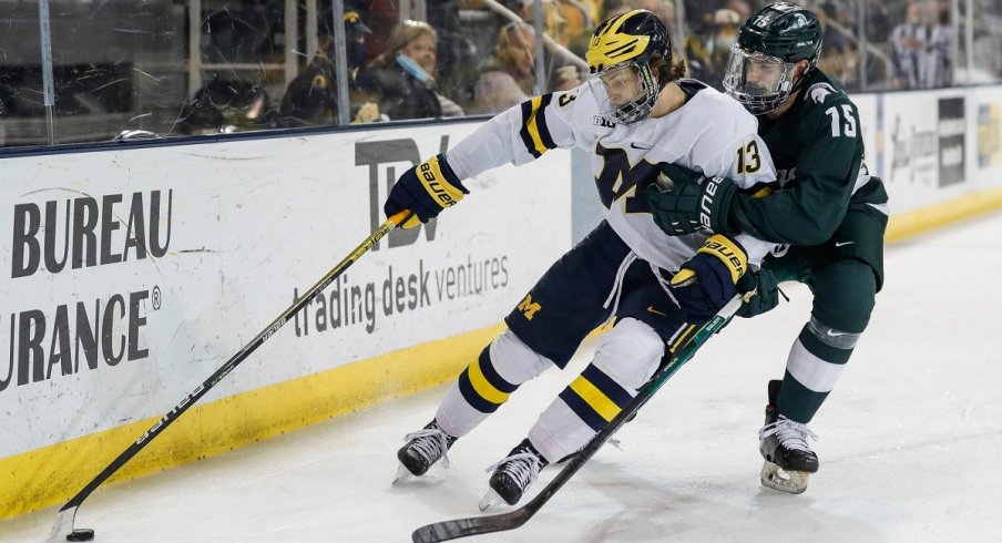 Kent Johnson skates against Michigan State University 