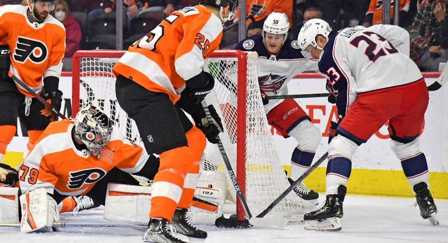 Apr 5, 2022; Philadelphia, Pennsylvania, USA; Columbus Blue Jackets center Brendan Gaunce (23) scores a goal against Philadelphia Flyers goaltender Carter Hart (79) during the first period at Wells Fargo Center. 