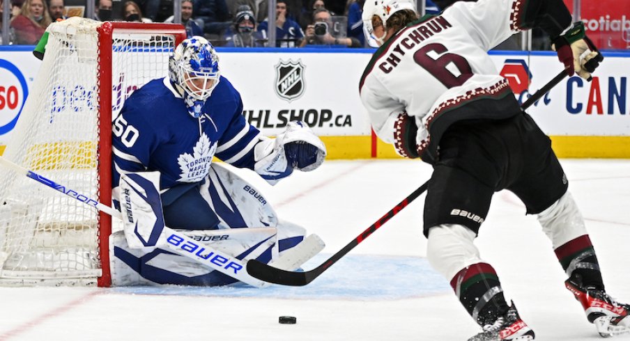 Arizona Coyotes' Jakob Chychrun moves in for a scoring attempt on Toronto Maple Leafs' Erik Kallgren in the second period at Scotiabank Arena.