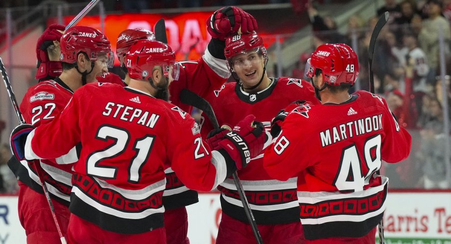 The Carolina Hurricanes celebrate a goal against the Blue Jackets 