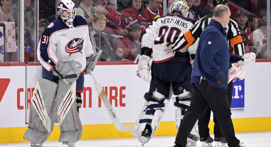 Columbus Blue Jackets' Michael Hutchinson substitutes teammate Elvis Merzlikins during the second period against the Montreal Canadiens at the Bell Centre.