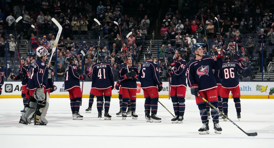 Columbus Blue Jackets players celebrate after the game against the Buffalo Sabres at Nationwide Arena