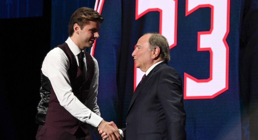 NHL commissioner Gary Bettman congratulates Columbus Blue jackets second overall pick Adam Fantilli during round one of the 2023 NHL Draft at Bridgestone Arena.