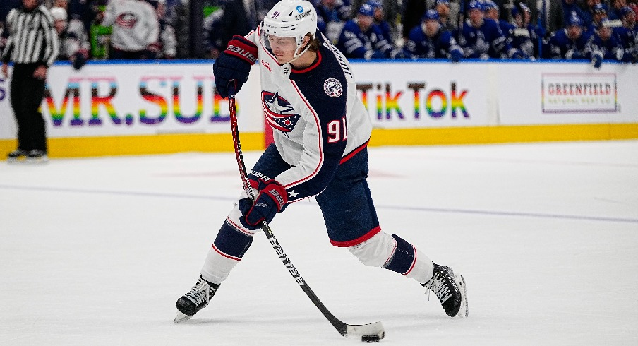 Columbus Blue Jackets forward Kent Johnson (91) shoots the puck against the Toronto Maple Leafs during the second period at Scotiabank Arena.