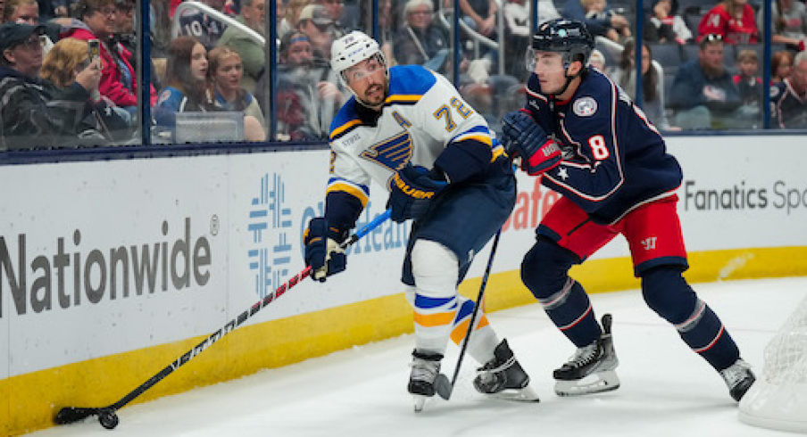 St. Louis Blues defenseman Justin Faulk (72) skates with the puck against Columbus Blue Jackets defenseman Zach Werenski (8) in the second period at Nationwide Arena.