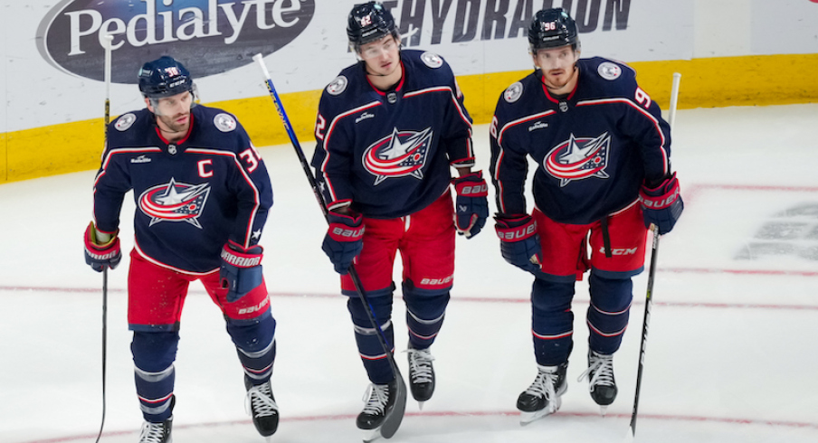 Columbus Blue Jackets' Boone Jenner celebrates with teammates after scoring a goal against the St. Louis Blues in the first period at Nationwide Arena.