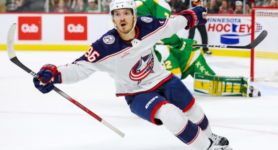 Columbus Blue Jackets center Jack Roslovic (96) celebrates his game winning goal against the Minnesota Wild during overtime at Xcel Energy Center.