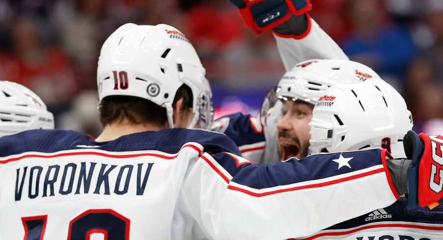 Columbus Blue Jackets left wing Dmitri Voronkov (10) celebrates with teammates after scoring a goal against the Washington Capitals in the second period at Capital One Arena.