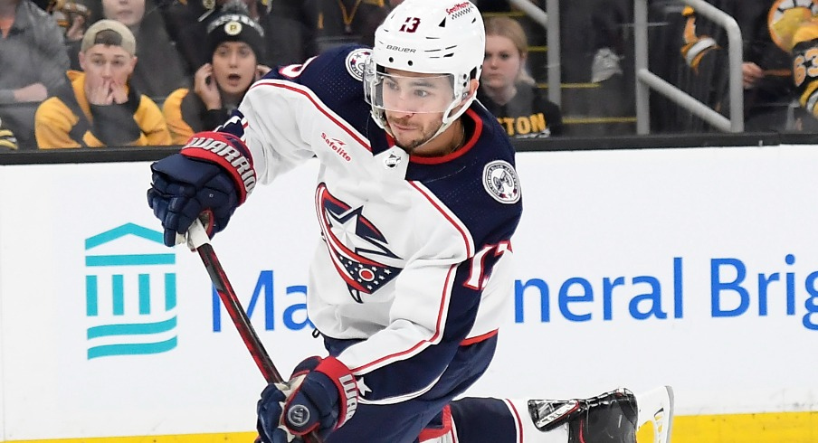 Columbus Blue Jackets left wing Johnny Gaudreau (13) shoots the puck during the second period against the Boston Bruins at TD Garden.