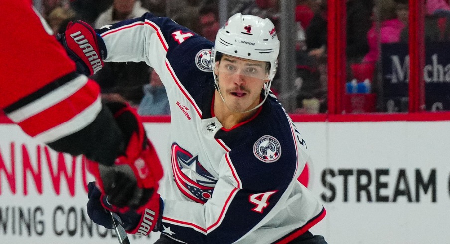 Columbus Blue Jackets center Cole Sillinger (4) skates with the puck against the Carolina Hurricanes during the second period at PNC Arena.