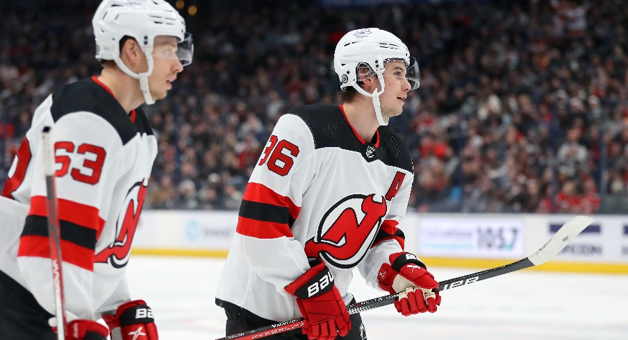 New Jersey Devils center Jack Hughes (86) celebrates his second goal of the game with left wing Jesper Bratt (63) during the second period against the Columbus Blue Jackets at Nationwide Arena.