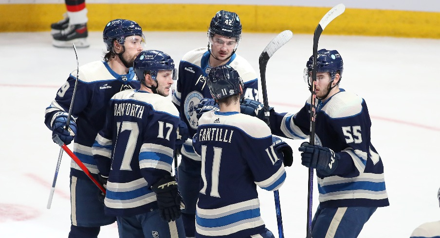 Columbus Blue Jackets center Alexandre Texier (42) celebrates his goal with teammates during the third period against the New Jersey Devils at Nationwide Arena.