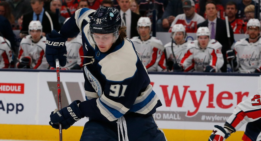 Columbus Blue Jackets left wing Kent Johnson (91) skates away from Washington Capitals left wing Beck Malenstyn (47) during the first period at Nationwide Arena.