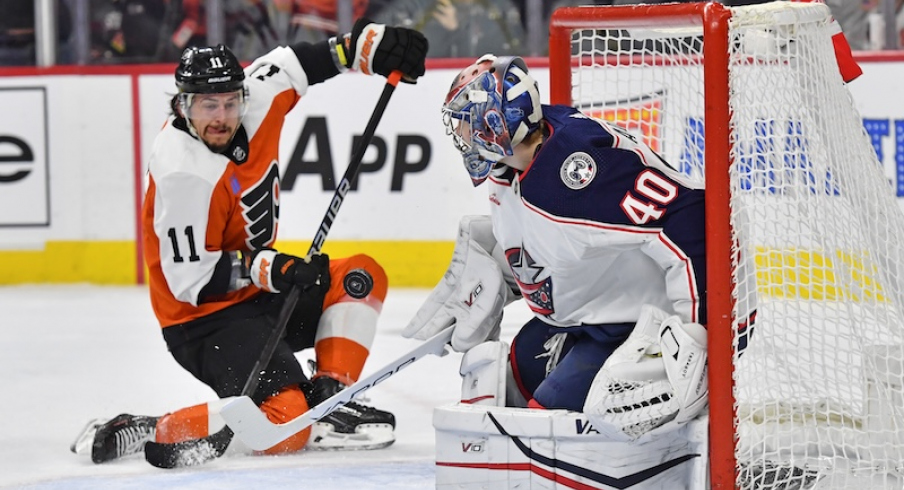 Columbus Blue Jackets' Daniil Tarasov makes a save against Philadelphia Flyers' Travis Konecny during the first period at Wells Fargo Center.