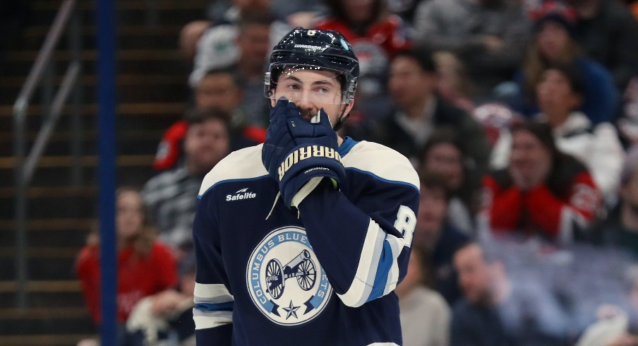 Columbus Blue Jackets defenseman Zach Werenski (8) reacts to a missed shot during the first period against the New Jersey Devils at Nationwide Arena.