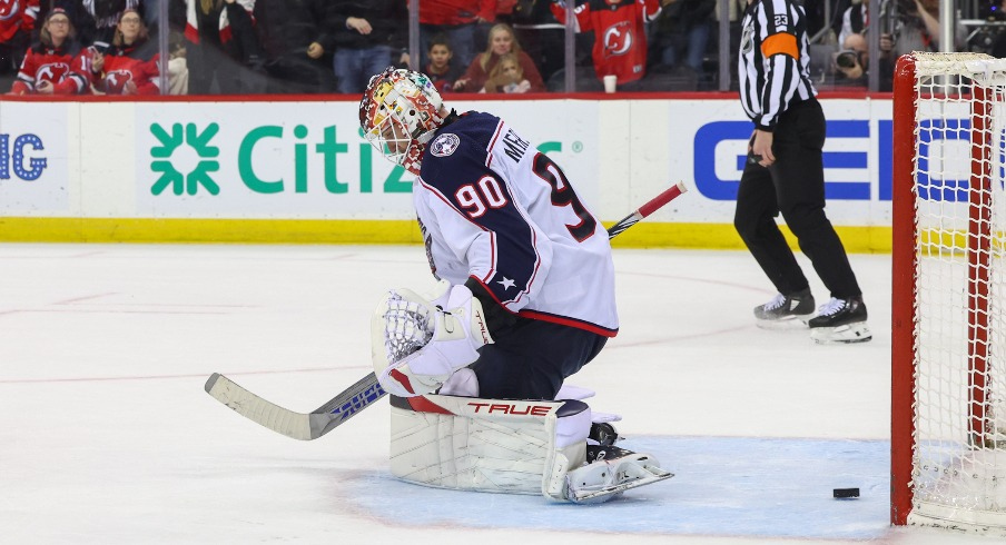 New Jersey Devils right wing Timo Meier (28) scores a goal on Columbus Blue Jackets goaltender Elvis Merzlikins (90) during overtime at Prudential Center.