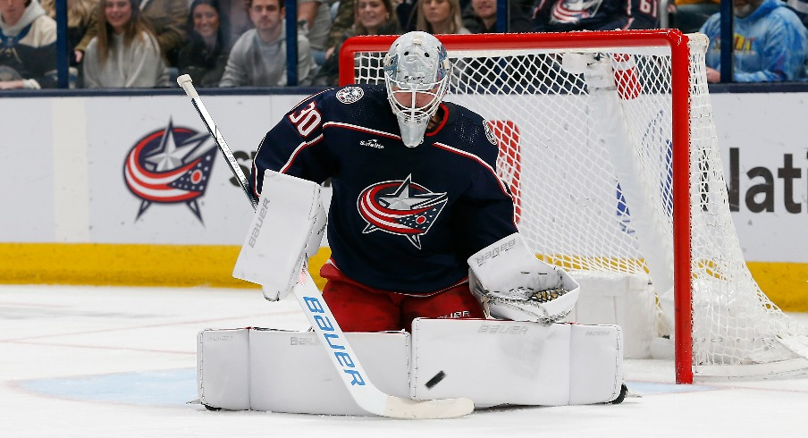 Columbus Blue Jackets goalie Spencer Martin (30) makes a pad save against the Toronto Maple Leafs during the second period at Nationwide Arena.