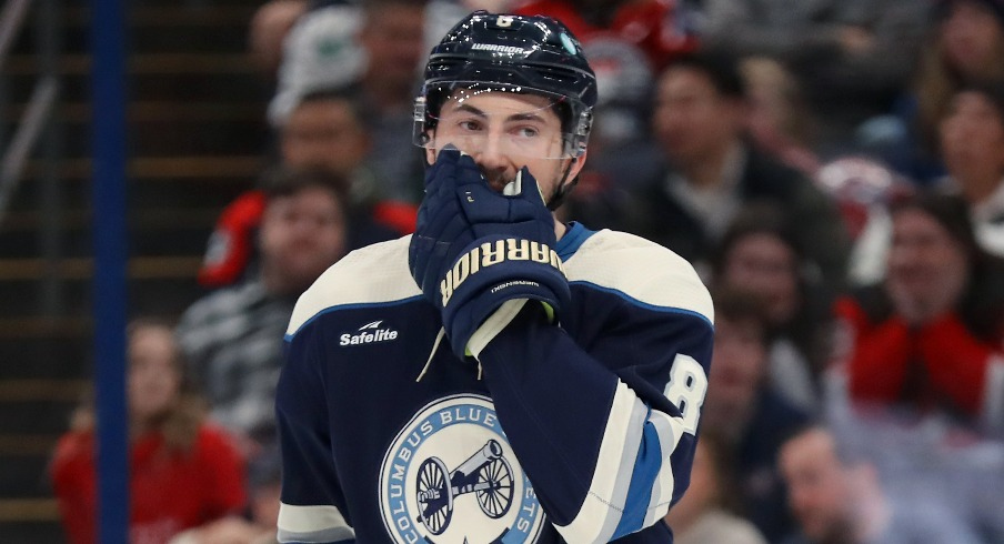 Columbus Blue Jackets defenseman Zach Werenski (8) reacts to a missed shot during the first period against the New Jersey Devils at Nationwide Arena.