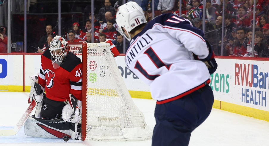 New Jersey Devils goaltender Vitek Vanecek (41) makes a save on Columbus Blue Jackets center Adam Fantilli (11) during the first period at Prudential Center.