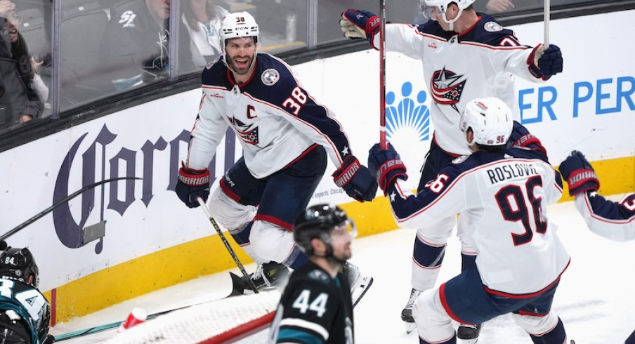 Columbus Blue Jackets' Boone Jenner celebrates with Damon Severson and Jack Roslovic after scoring a goal against the San Jose Sharks during the second period at SAP Center at San Jose.