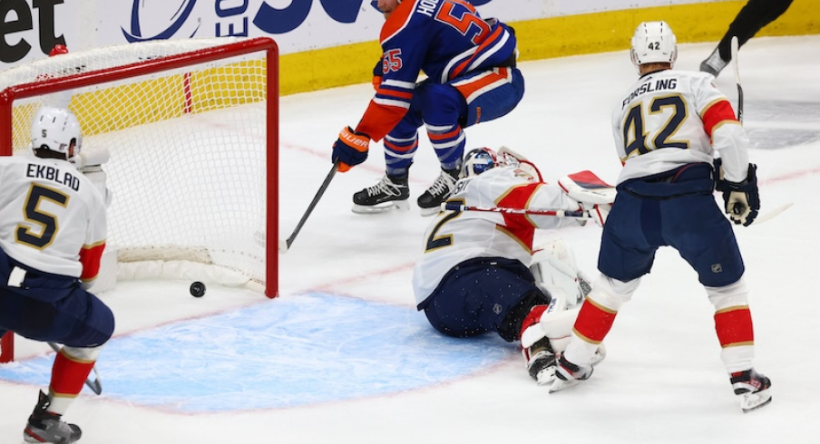 Edmonton Oilers left wing Dylan Holloway (55) skates passed Florida Panthers goaltender Sergei Bobrovsky (72) in the first period in game four of the 2024 Stanley Cup Final at Rogers Place.