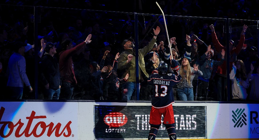 Columbus Blue Jackets left wing Johnny Gaudreau tosses a stick into the crowd after the game the Nashville Predators at Nationwide Arena.