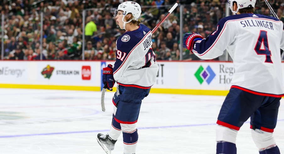 Columbus Blue Jackets center Kent Johnson (91) celebrates his goal against the Minnesota Wild during the second period at Xcel Energy Center.