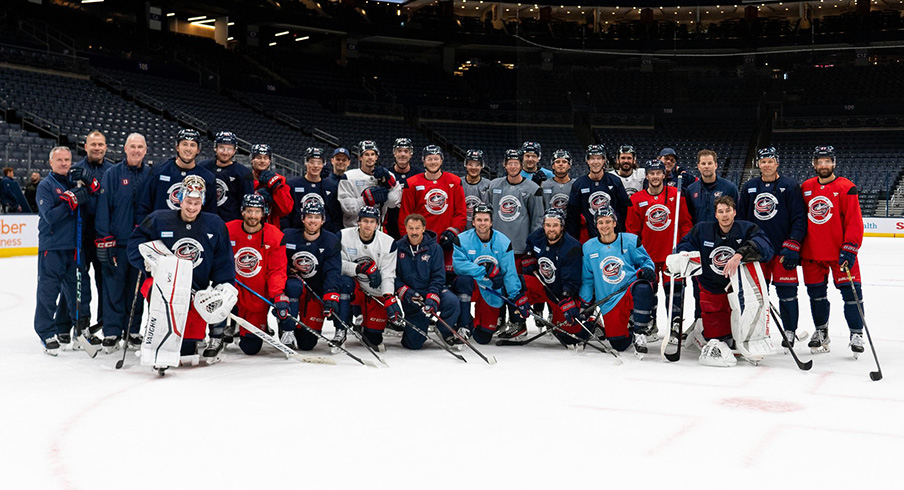 Guy Gaudrea in a team photo with the 2024-25 Columbus Blue Jackets