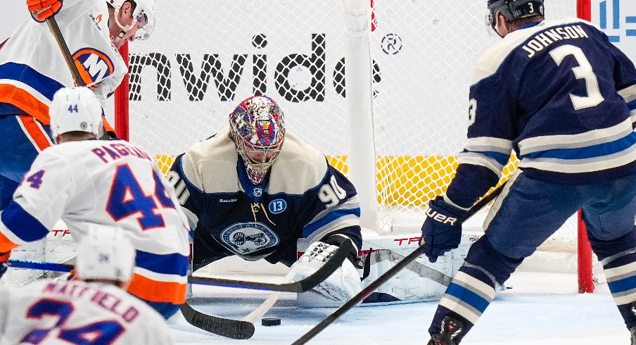 Columbus Blue Jackets goaltender Elvis Merzlikins (90) blocks a shot in the second period against the New York Islanders at Nationwide Arena.