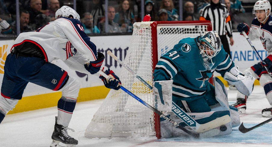 The Columbus Blue Jackets got in excess of 50 shots on goal Tuesday night but fell in overtime to the San Jose Sharks.