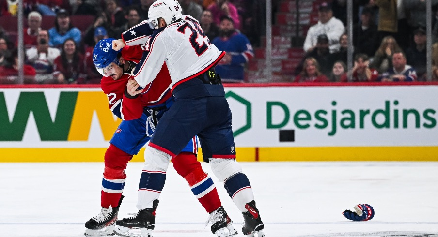 Columbus Blue Jackets right wing Mathieu Olivier (24) and Montreal Canadiens defenseman Arber Xhekaj (72) fight during the second period at Bell Centre.