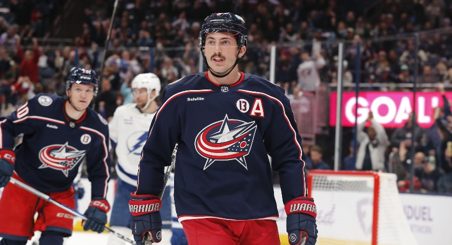 Columbus Blue Jackets defenseman Zach Werenski (8) looks on against the Tampa Bay Lightning during the second period at Nationwide Arena.