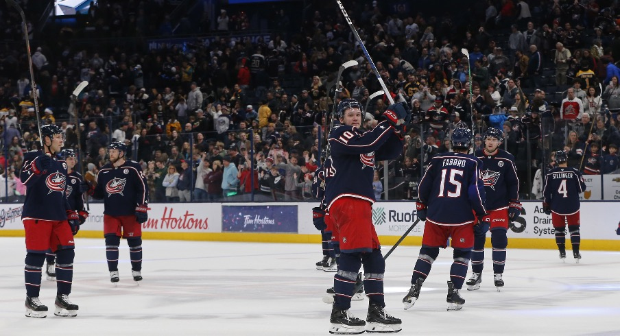 The Columbus Blue Jackets acknowledge the crowd after the game against the Boston Bruins at Nationwide Arena.