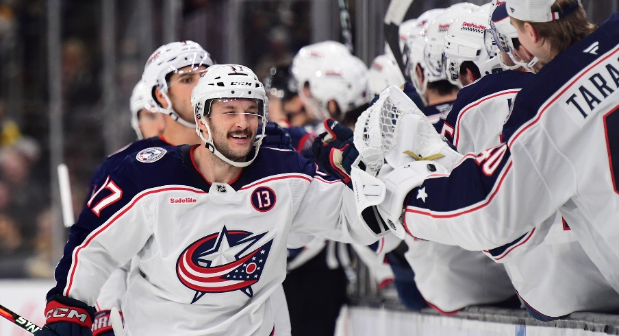 Columbus Blue Jackets right wing Justin Danforth (17) celebrates his shorthanded goal with his teammates during the third period against the Boston Bruins at TD Garden.