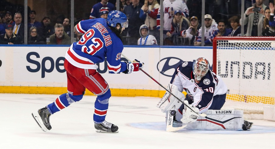 New York Rangers center Mika Zibanejad (93) takes a shot at Columbus Blue Jackets goalie Daniil Tarasov (40) in a shootout at Madison Square Garden.