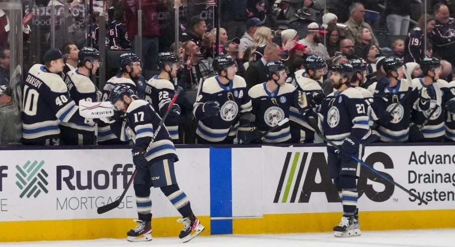 Columbus Blue Jackets right wing Justin Danforth (17) celebrates with teammates on the bench after scoring a goal against the New York Rangers in the first period at Nationwide Arena.