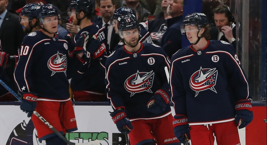 Zach Werenski kept his historic point streak going in a big way and Kent Johnson added a pair of goals in a dominant, 5-1 win by the Blue Jackets on Saturday night over the Blackhawks.