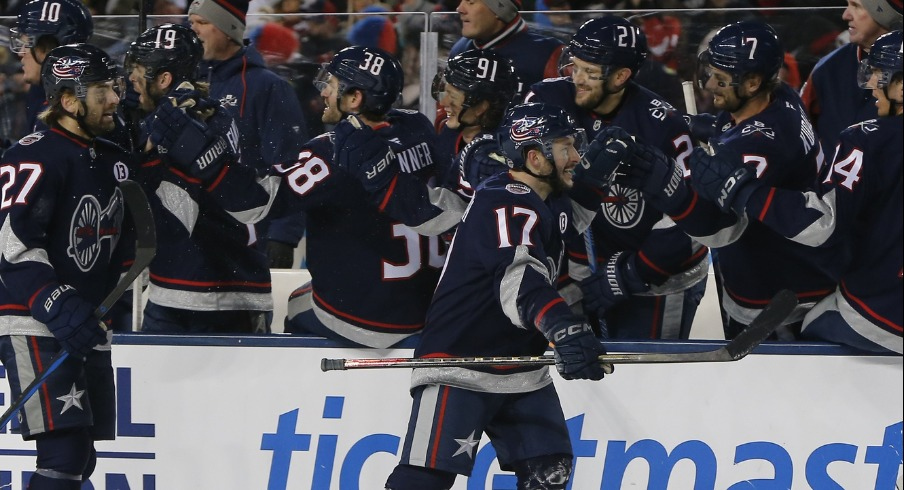 Justin Danforth scored the game-winning goal with just over two minutes left and Elvis Merzlikins made 43 in Columbus' 5-3 Stadium Series victory over Detroit.